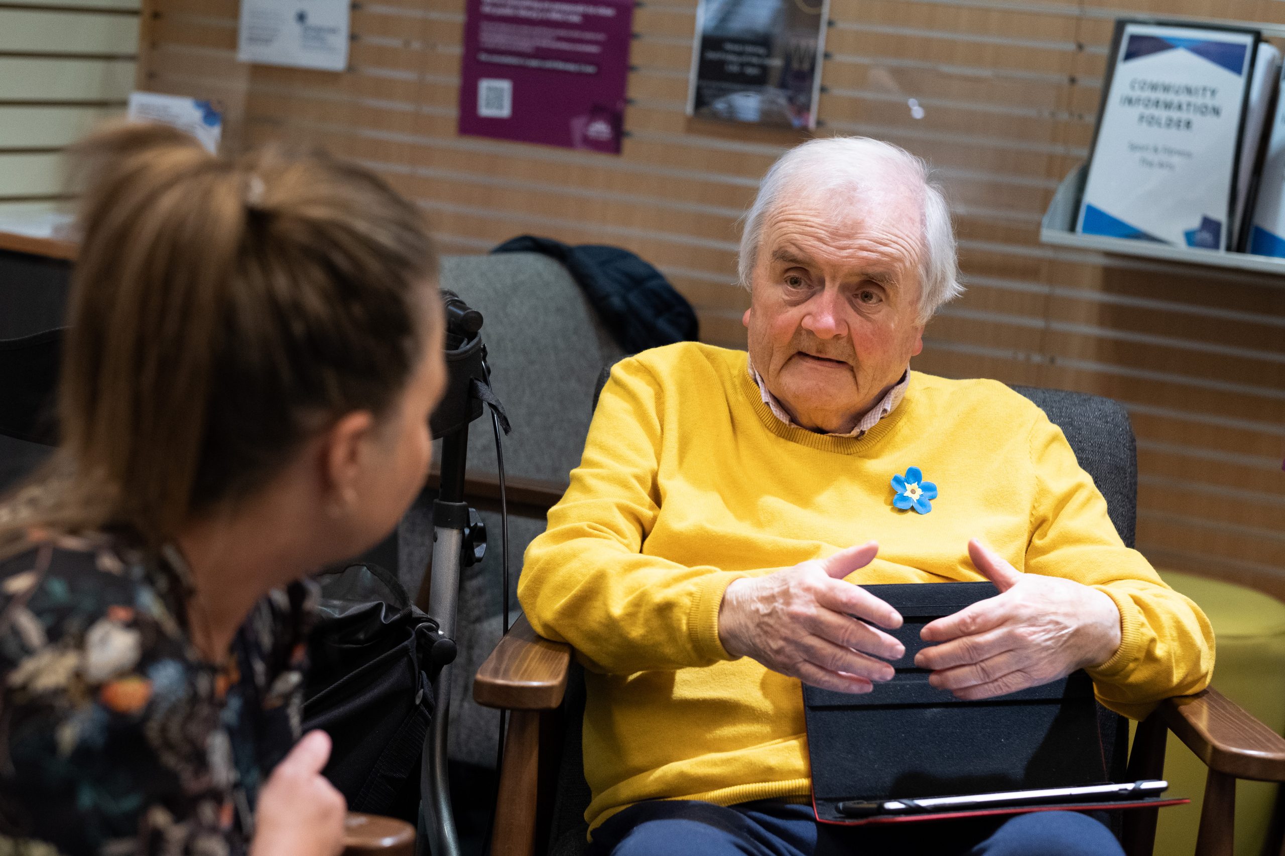 Memory Assessment Support patient Stan, an older man talking to a younger woman