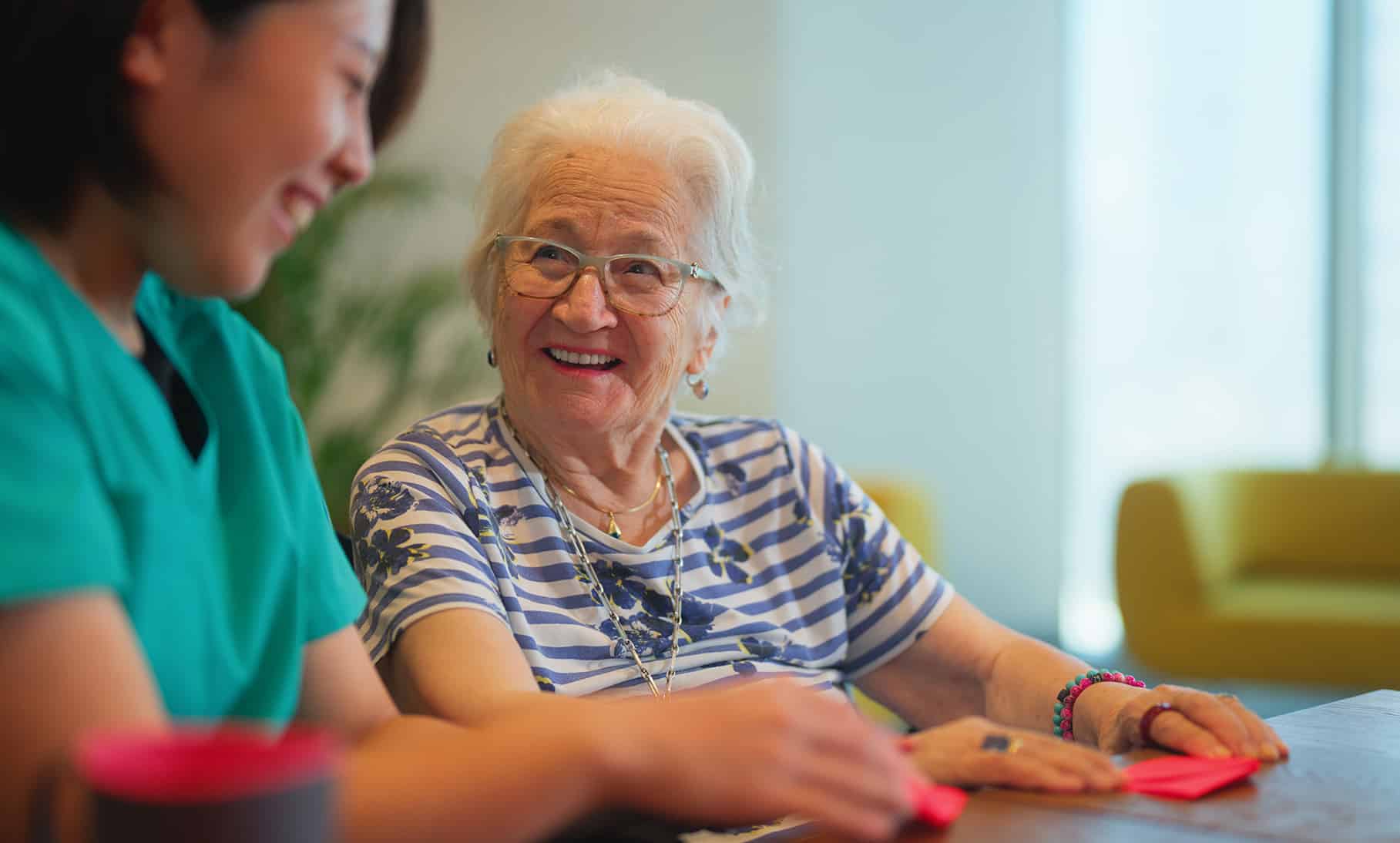 woman in dementia assesment smiling