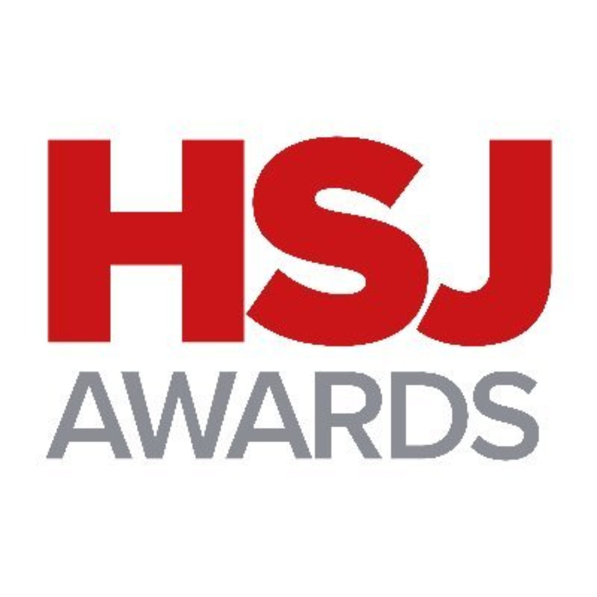 HSJ-awards 2025 Photo of two white women outside with trees in the background. stood next to each other and smiling towards the camera. The woman on the left has long hair and the woman on the right has a short bobbed hair cut.